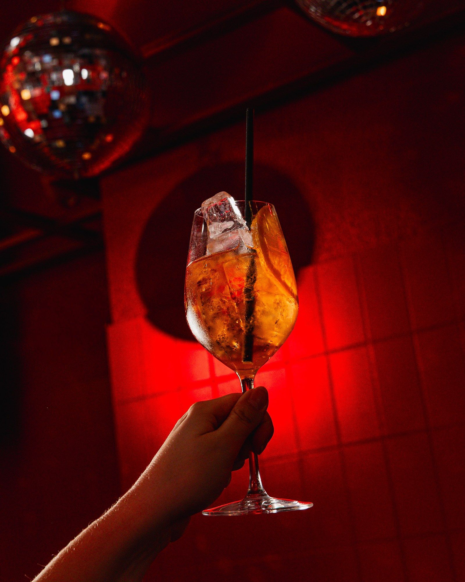 Cocktails under disco balls at Dr Goodes
